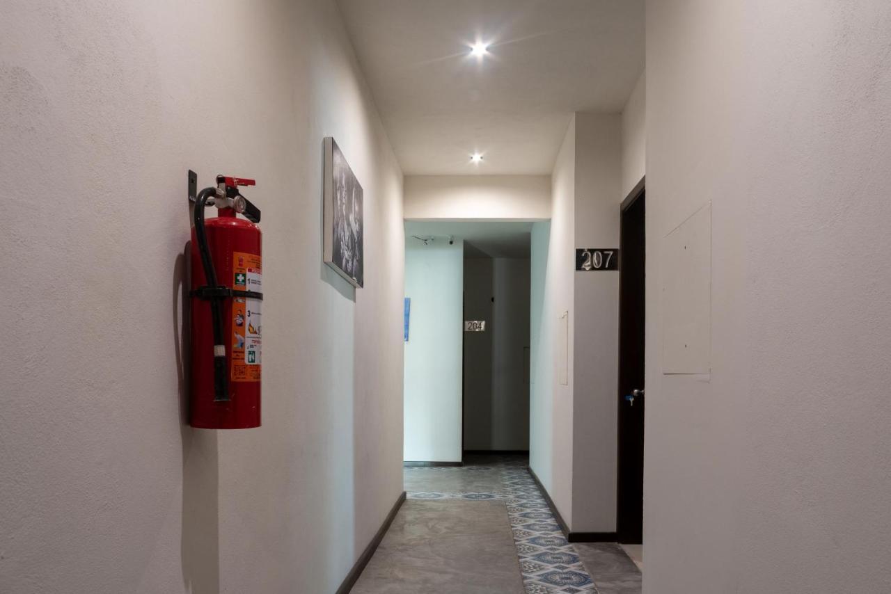 Hotel Mayari Holbox Bagian luar foto A fire extinguisher in a hotel