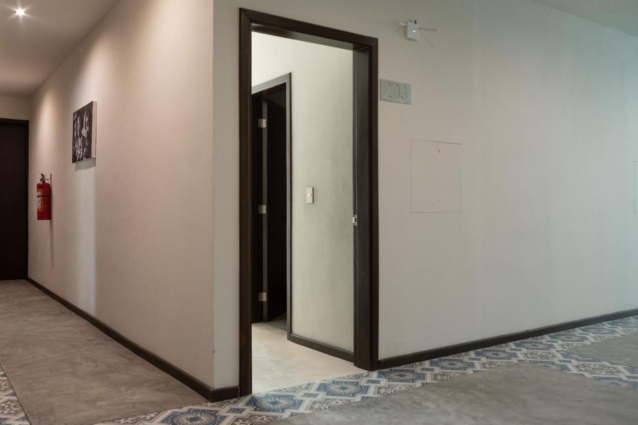 Hotel Mayari Holbox Bagian luar foto A door opening