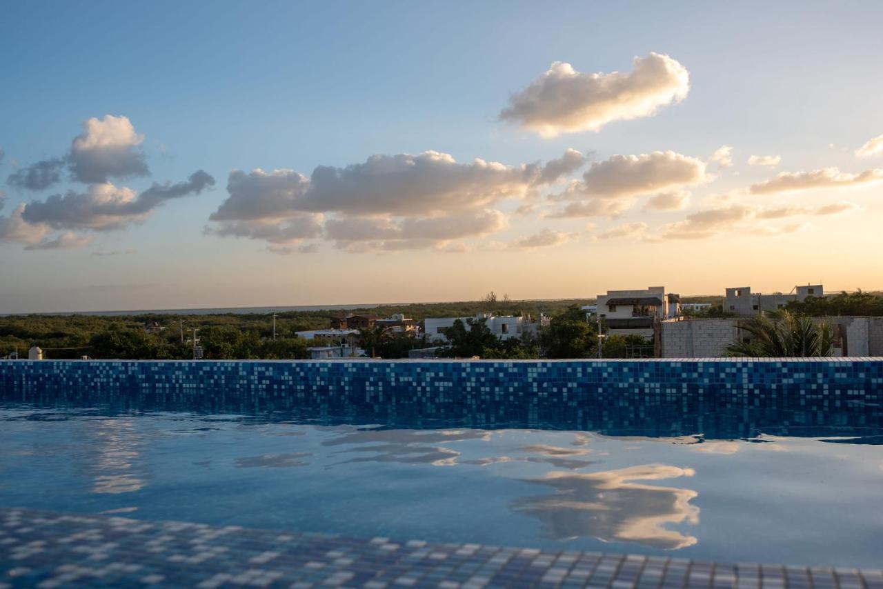 Hotel Mayari Holbox Bagian luar foto Sunset over Tulum
