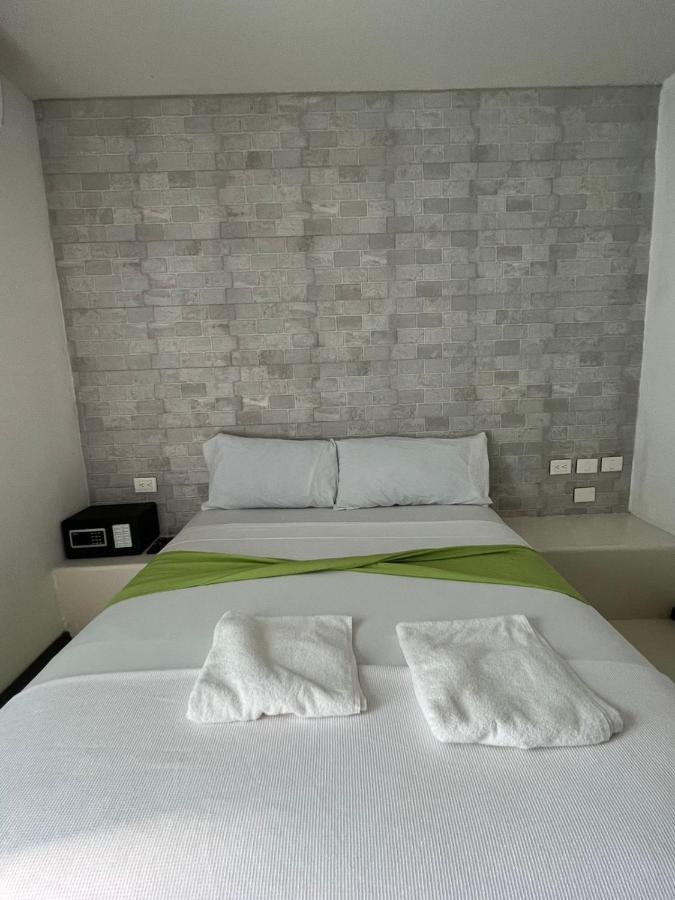 Hotel Mayari Holbox Bagian luar foto A bedroom at the hotel